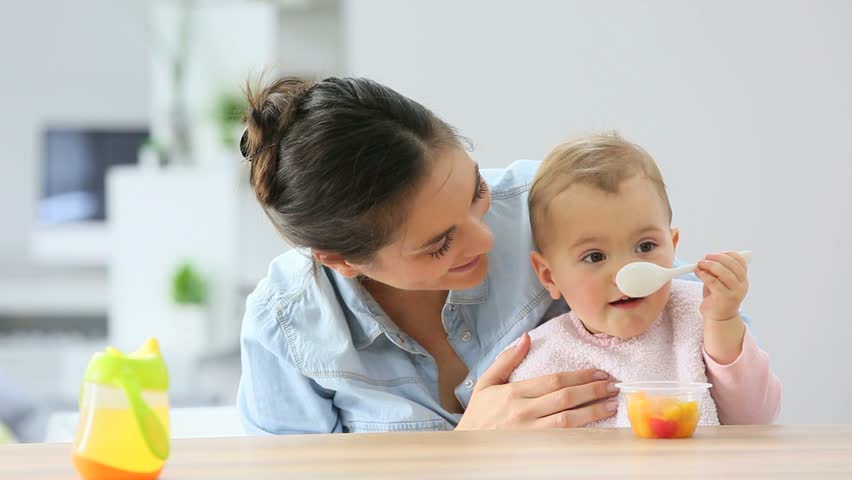 Young Mother Helping Baby Girl Stock Footage Video 100 Royaltyfree