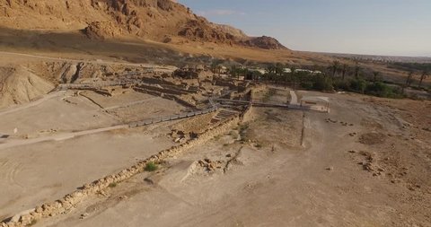 Soaring aerial view above the Dead Sea Scroll caves in Qumran, Israel. Filmed using a DJI Inspire drone.
