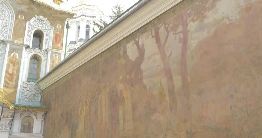 The main entrance to Kiev-Pechersk Lavra. Paintings, frescoes of the holy fathers of the Kievo-Pecherska Church. To the right of the entrance is Theodosius Pechersky with a cross in his hand,