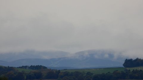 Foggy clouds moves in Scottish highland