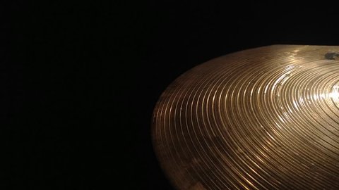 Close up of a crash cymbal as it is performed