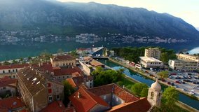 Church of St. Nicholas in Kotor, in Montenegro, Kotor bay with a bird's-eye view. Aerial photography, shooting from above. The old church in Montenegro, in the heart of the old city. Roofs of Kotor