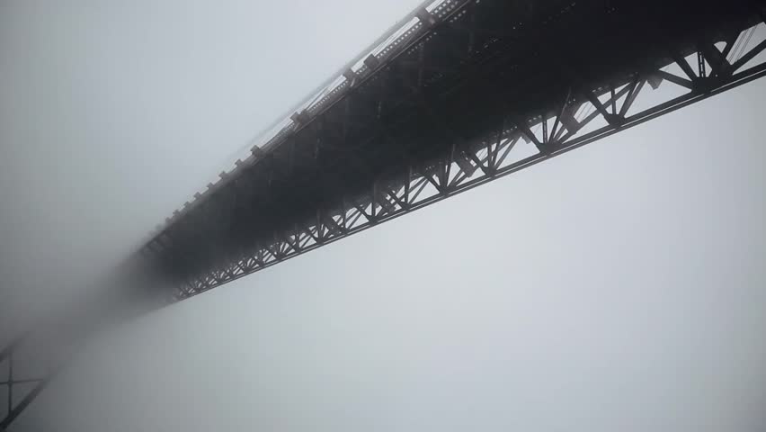 Cinemagraph Loop - mist rolling in with a bridge in the background - motion photo