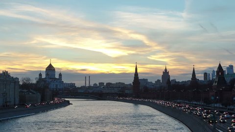 Russia. Ensemble of Moscow Kremlin and Moskva-City business center view across Moskva river at a winter day to night transition timelapse hyperlapse 4K