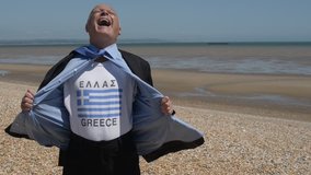 Greek businessman, opening his suit to reveal a t-shirt with the Greek national flag. The man is looking to the sky and screaming in frustration. Location is an empty beach with the sea at low tide.