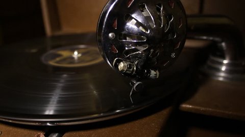 Gramophone Disc Rotates and Stops.
On the old gramaphone record spinning and then stops. From gramophone hear the music
