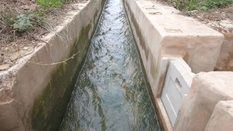 Water Flowing in a Concrete Irrigation Ditch