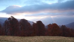 Colorful autumn sunrise in the Carpathian mountains. Tarantyn ridge, Ukraine, Europe. HD video (High Definition). 