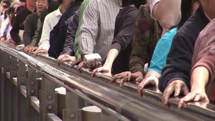 Clown Throwing Pie On Escalator