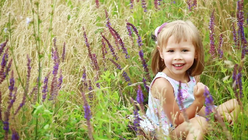 Little girl showing white teeth 