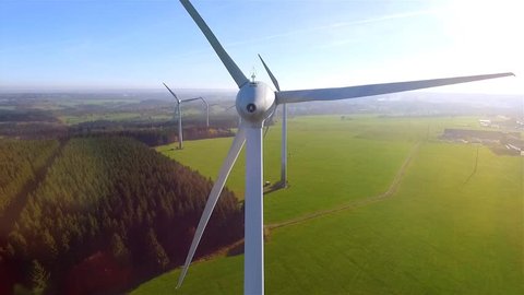 AERIAL 4K / Ultra HD - Birds eye view on Wind Power, Turbine, Windmill, Energy Production - Clean and Renewable Energy