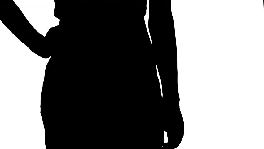 Slim, sporty girl in big jeans, showing her lose weight and spinning, on white background, silhouette