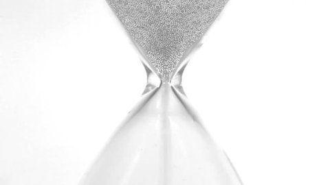 Hourglass closeup over white