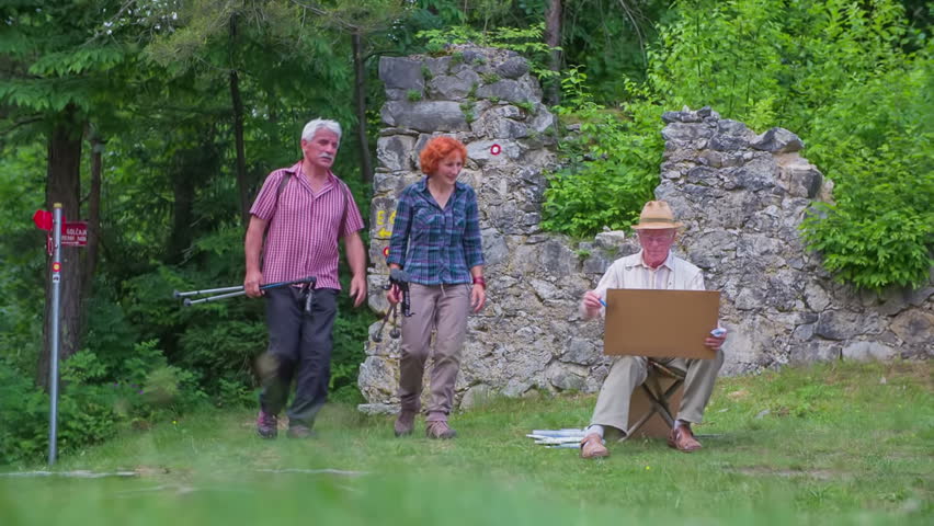An artist and a senior couple meet on top of the hill with church on it. He is creating his new picture, and they are hiking and are there to see the church. 