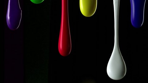 Cinemagraph - Paint dripping on black background shooting with high speed camera. Motion Photo. Video stock