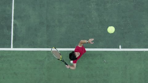 Cinemagraph - Tennis serve in slow motion from overhead angle. Shot on RED Epic. Motion Photo. Stock Video