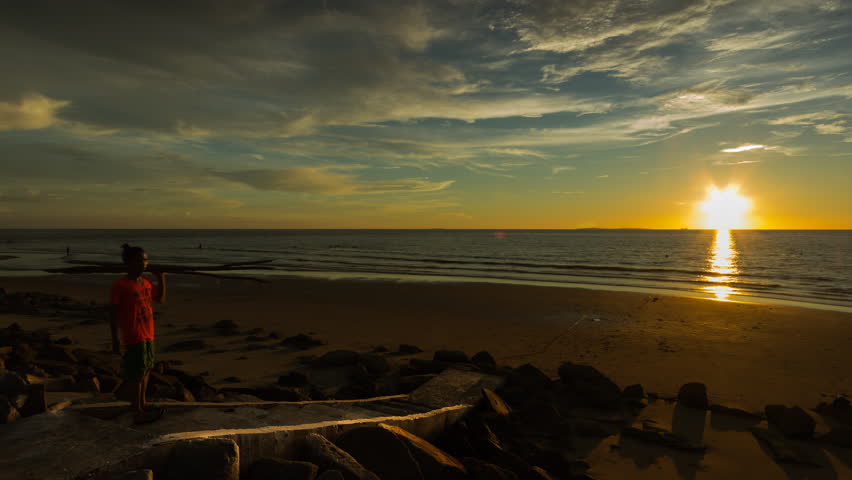 A walk stair in the beach with beautiful changes of the sunset sky.