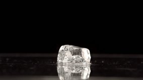Hammer smashing ice on black background in slow motion - Powered by Shutterstock - Get 15% off with code: PIKWIZARD15
