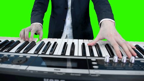 hands playing on electric piano