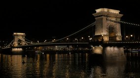 Famous Chain Szechenyi Bridge by night in Budapest Hungary and Danube 4K 2160p UltraHD 30fps  footage - Chain Bridge located in Hungarian capital Budapest by night 4K 3840X2160 30fps UHD video