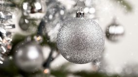 silver decorated christmas tree with snow effect - Powered by Shutterstock - Get 15% off with code: PIKWIZARD15