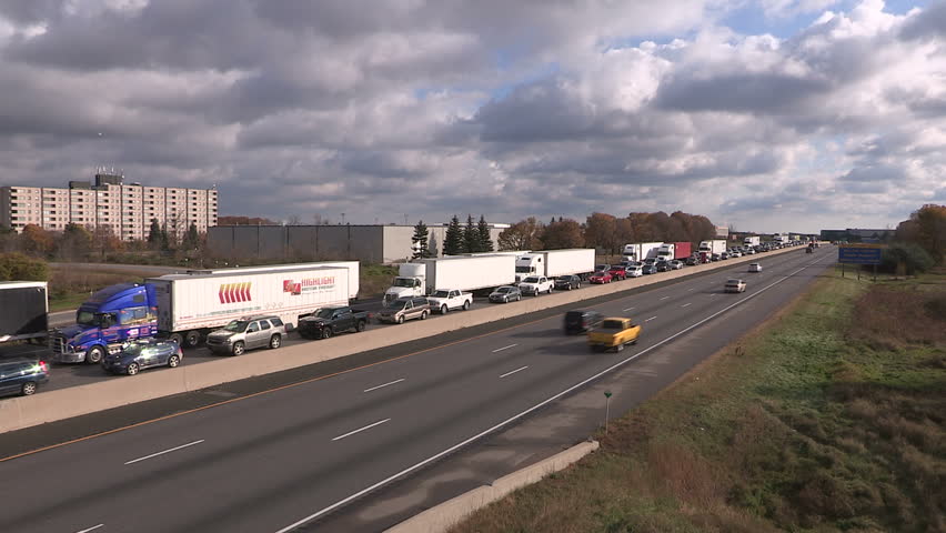 Ontario, Canada, November 2015 Traffic jam and gridlock on highway 401 in Ontario
 | Shutterstock HD Video #12606701