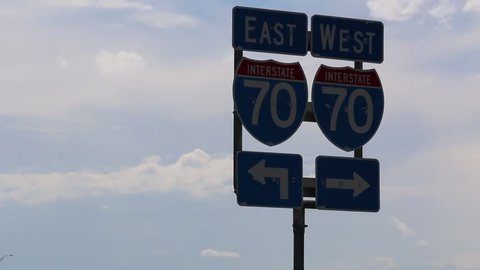 Closeup of I-70 East/West Road Sign