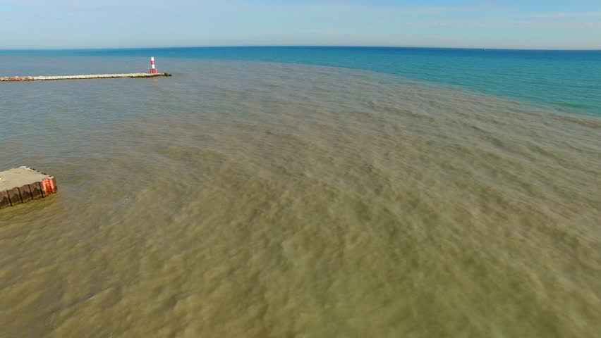 Scenic Flyover of Lighthouse on Lake Michigan
