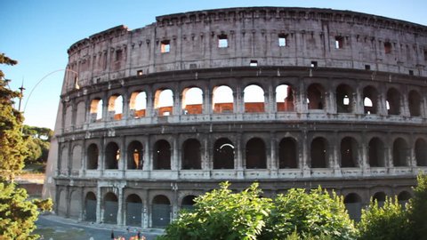 Colosseum or Flavian Amphitheatre in Rome, view from passing bus