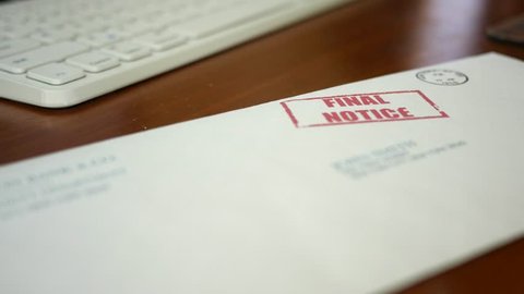 A man hesitates to open a final notice foreclosure letter from a bank