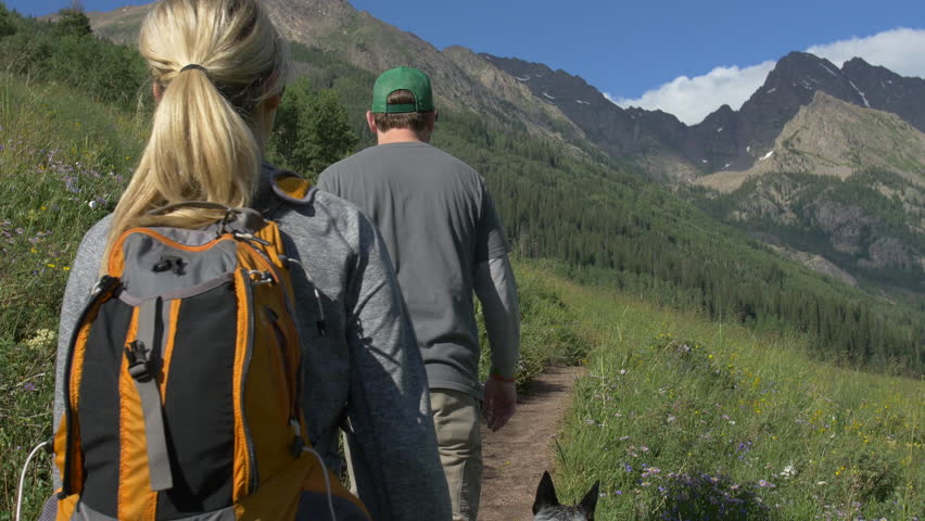 4k Couple and dog hike beautiful mountain trail in Colorado | Shutterstock HD Video #12638855