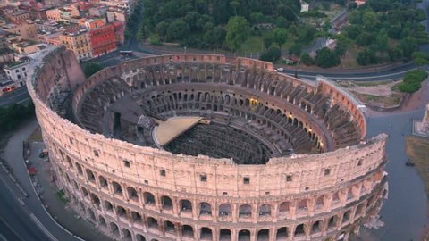 17 September 2015 :Colosseum, Rome, Italy. Aerial Roman Coliseum on sunrise. Beautiful view of the famous Italian landmark travel icon in the Roman forum.