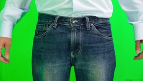  Businessman standing on the greenscreen (green screen) background and turning his empty pocket inside out to show his broke and out of money. Recession or no money, financial crisis concept. 
 - Powered by Shutterstock - Get 15% off with code: PIKWIZARD15