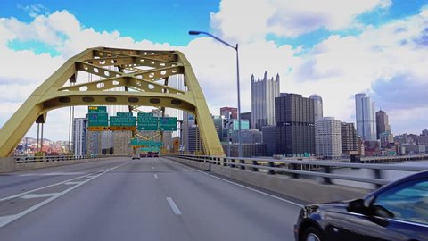 PITTSBURGH, PA - Circa November, 2015 - A view of Pittsburgh as you emerge from the Fort Pitt Tunnels. Shot with a gimbal for steady motion.