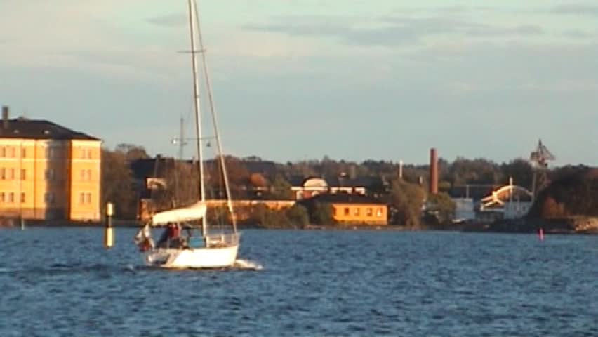 Yacht passing by Suomenlinna fortification island