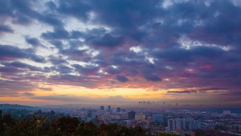 Sunrise over Los Angeles cityscape. Zoom in on downtown. 4K UHD Timelapse.