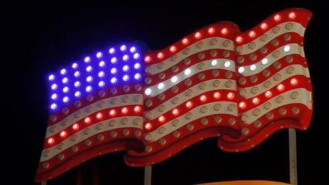 American flag lightbulb sign at the funfair Stock Video