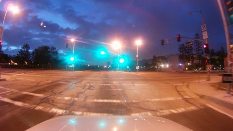 Time lapse from car driving on a fluid freeway at dawn