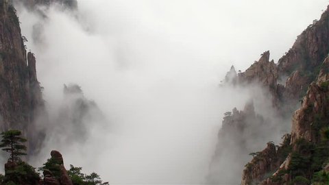 Amazing time-lapse scene of Mist moving in the most famous mountain in China, Mount Huangshan