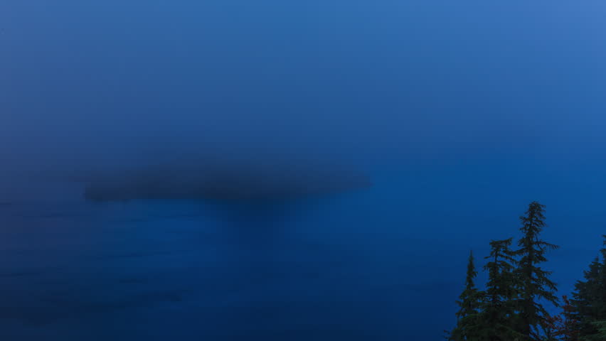Sunrise with fog at Crater Lake National Park, Oregon, USA