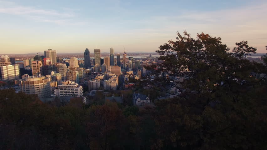 4K aerial drone shot of montreal skyline at sunset forward move Royalty-Free Stock Footage #12731351