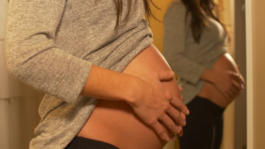 Rubbing belly rubs. Pregnant belly RUB. Belly up.