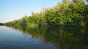 Picturesque panorama of the river from the boat.
Original video for a postprocessing