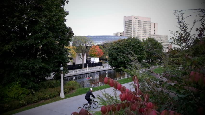 Cinemagraph Loop of Kayak and cyclist on The Rideau Canal in Ottawa. Canada