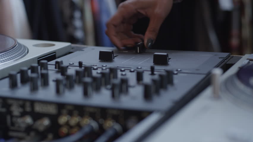 Dj spinning a record on a turntable in a shallow depth of field, slightly slow motion in 4K, can be sped up to normal, 23.98 easily  | Shutterstock HD Video #12742433