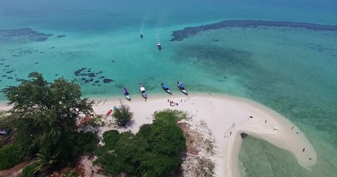 Aerial view on Thai traditional boats in Thailand. Samui island. Clear water and snorkling.