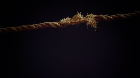 Tension of a Panic Attack Illustrated with Breaking Rope in Super Slow Motion