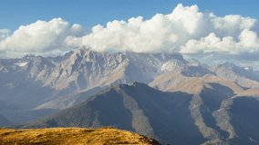 Fantasy-like awesome mountain beauty. Melting clouds. 4K Timelapse of the Ushba mountain. Caucasus. Svaneti. Georgia. Europe. UHD video (Ultra High Definition).
