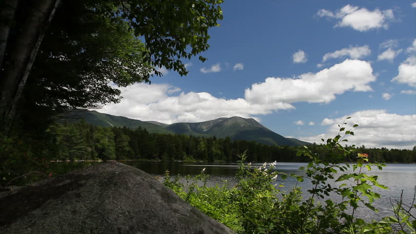 A beautiful panning view of Kidney pond and Mount Katahdin in Maine.