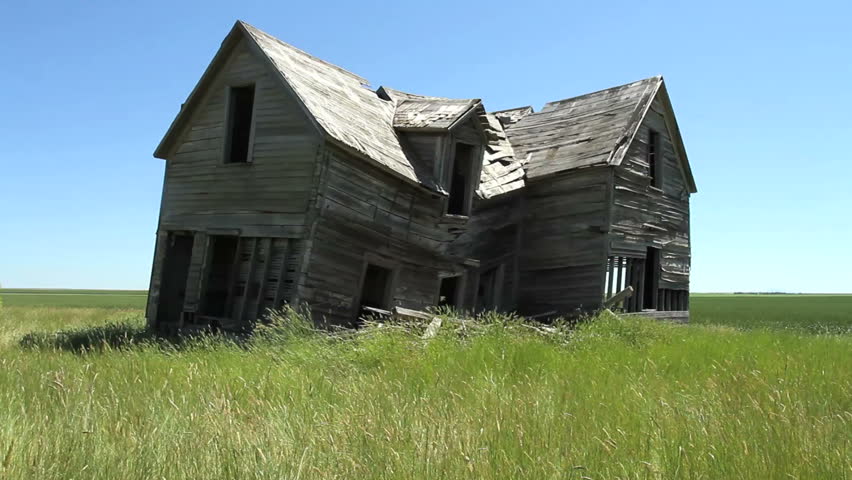 Old farm house in badly deteriorated condition